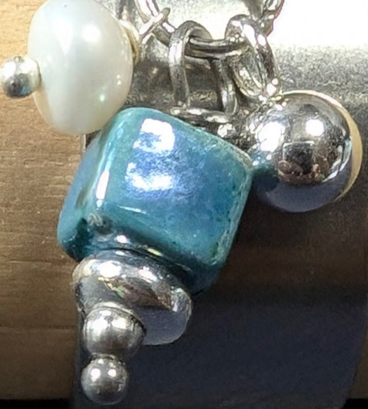 Bague réglable acier inoxydable avec charms