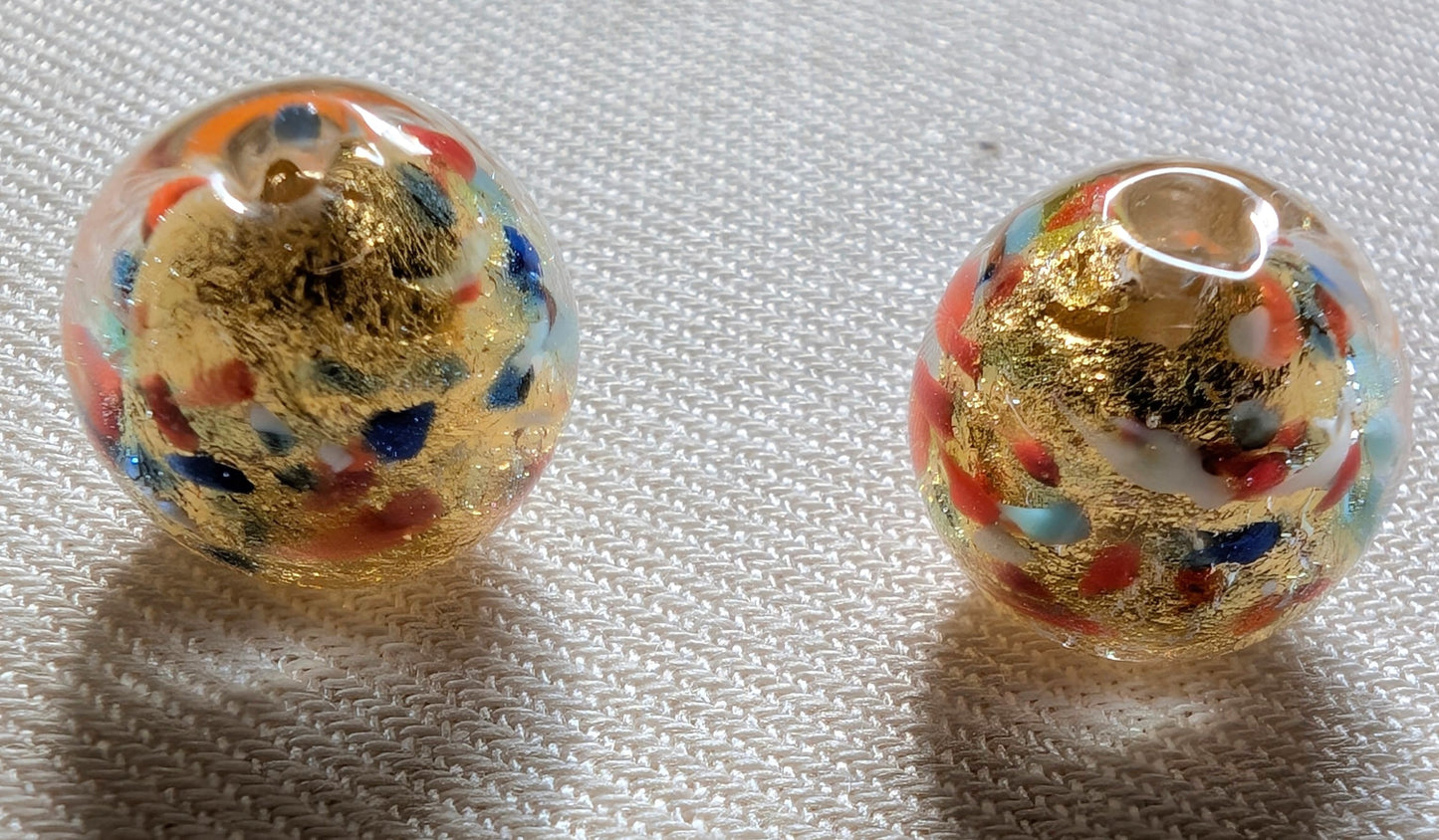 Perles de Murano aux reflets colorés