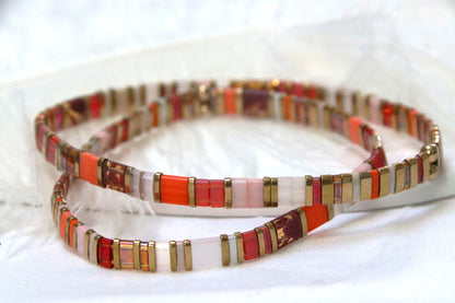 AyaKin : Un bijou vibrant où l’or rencontre la chaleur des teintes colorées. 2 bracelets 