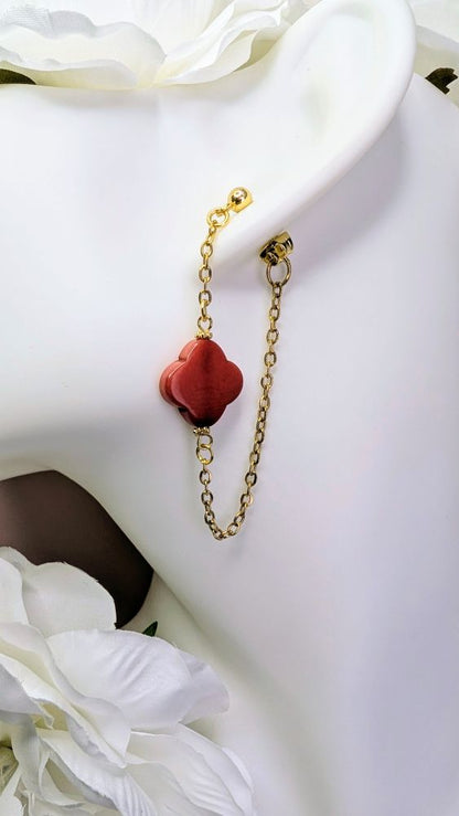 Les boucles d'oreilles Cléa rouge et doré un duo de choc