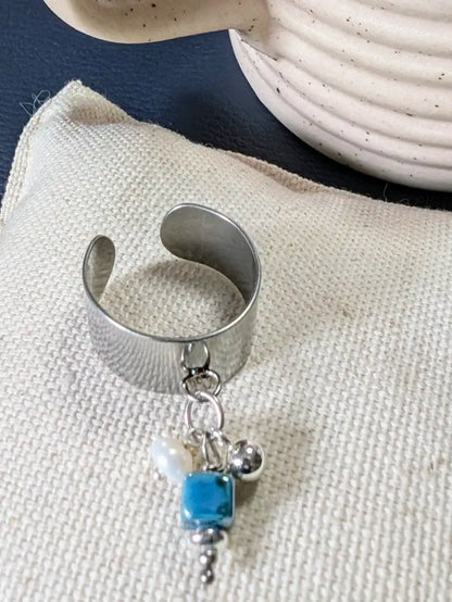 Bague réglable acier inoxydable avec charms