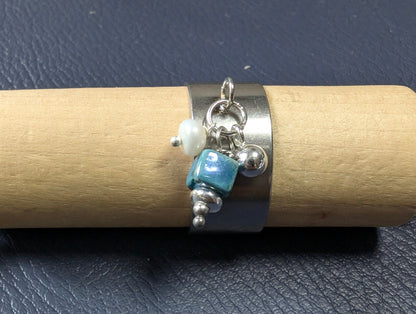 Bague réglable acier inoxydable avec charms
