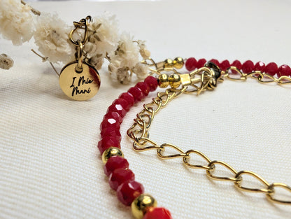 Bracelet Nola perles de verre facettées rouge et orangées avec cœur strass. Détail fermoir