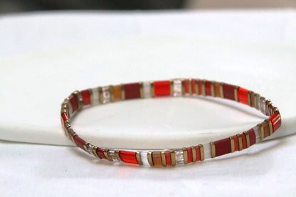 Bracelet en perles Miyuki rouges et orange transparentes mates au fini velouté