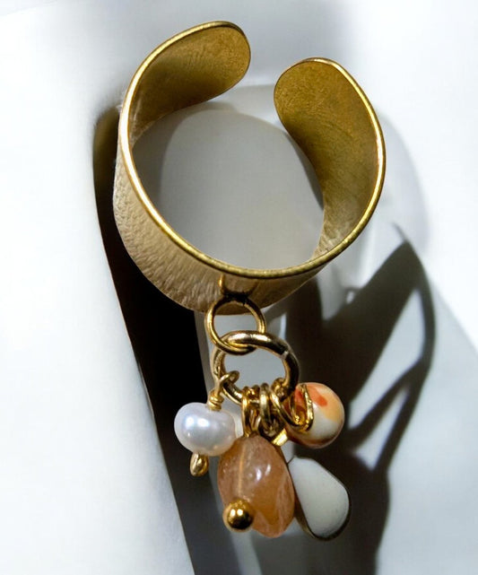 Bague réglable acier inoxydable dorée avec perles et émail dans les tons oranges et blancs