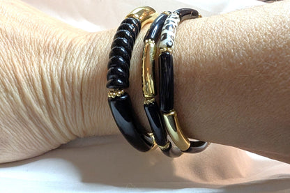 Bracelet fins et moyens en résine automne hiver – noir Portés au poignet
